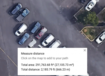 Google Maps showing distance and area of measured area